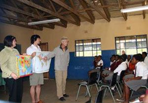 Books For Africa board members Henry Bromelkamp and Xavier Helgeson and Books For Africa Kilimanjaro Society member Barb Ryan visit Mafunda High School in South Africa.