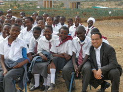 Congressman Ellison meets with students at a school in Kenya.