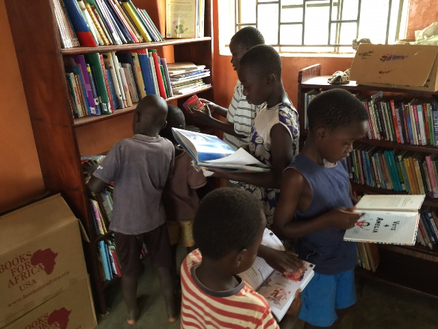 Children in Jinja digging into their recent BFA shipment