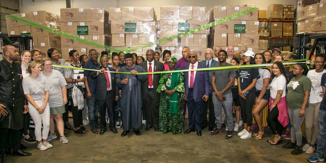Sir Emeka and BFA celebrate sending off an 11 container shipment to Nigeria