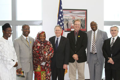 Representatives from Books For Africa and IFESH met with U.S. Ambassador to Nigeria Terence McCulley in October of 2011.