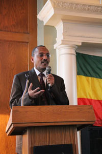 Ethiopian Ambassador Girma Birru Geda at the podium.