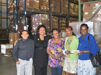 BFA board member Sabrina Jackson (second from left) with a group of volunteers at the BFA warehouse party.