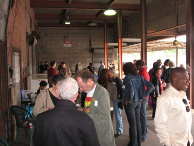 BFA supporters mingle at the braai on the loading dock at the BFA Minnesota warehouse.