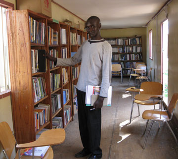 Students at Catholic University of Sudan constructed this library for their BFA books out of a 40-foot sea container.
