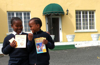 Students in Cape Town with their new BFA books, sent thanks to generous funding from Donaldson Company.