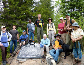 BFA founder Tom Warth (center) and fellow BFA supporters at the summit of Eagle Mountain in Minnesota.