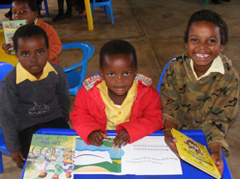 Students in the Eshowe region of South Africa with their BFA books.
