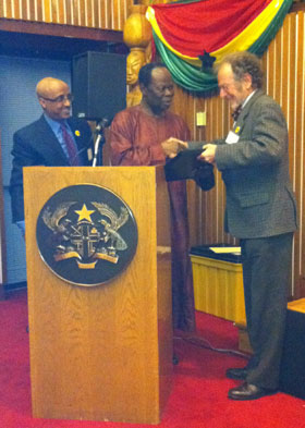 His Excellency Daniel Ohene Agyekum, Ghana’s Ambassador to the United States, presents BFA founder Tom Warth with an Award of Merit. BFA board member Asratie Teferra is at left.