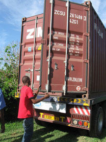 Unloading the 40-foot sea container of BFA books in Tanzania.