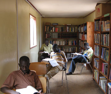 Students at Catholic University of Sudan study in the new provisional library they built out of a 40-foot sea container.