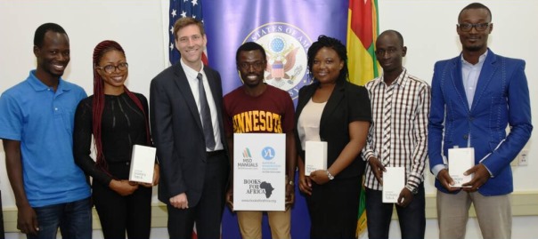 Mr. Ryan Ballow, U.S. Embassy’s Political-Economic Chief, and Mr. Akebim (middle with t-shirt), surrounded by recipients: Dr. Bagassam Sama (far right), Dr. Constant Djiwa, (second from right), Dr. Sonia Tchaptchet (3rd from right), and medical student Estelle Tchasees (second from left).