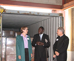 Standing infront of the delivery is Ruth Knoll, Dr. Cyril August Chami, and Father Robert Koopman of St. John's Abbey