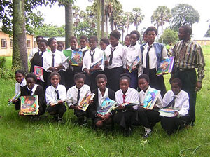 Students in Lubwe, Zambia right after receiving a container of books.